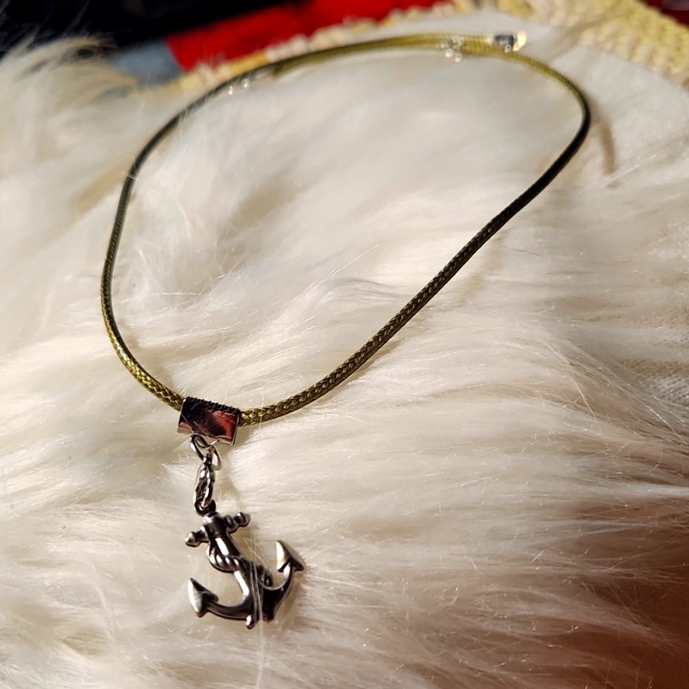 Hand crafted necklace made on a faux cord with an anchor charm